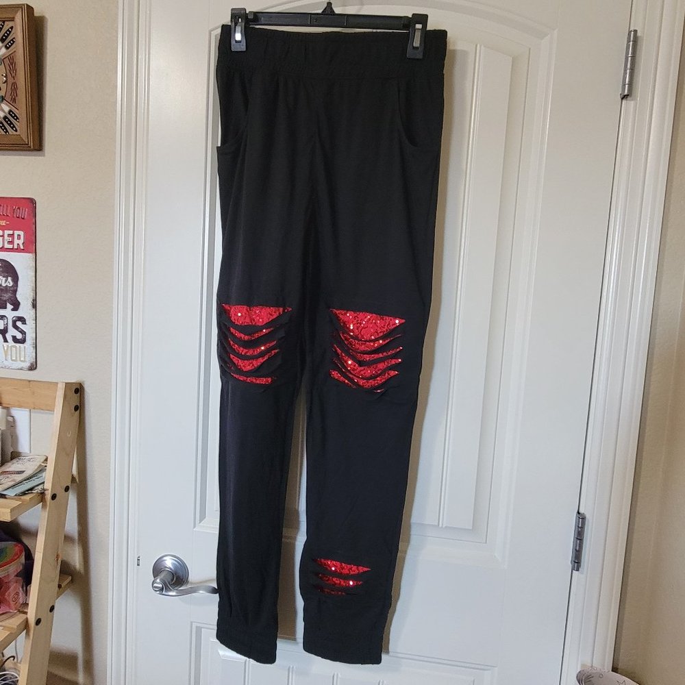 Black dance pants with red sequins